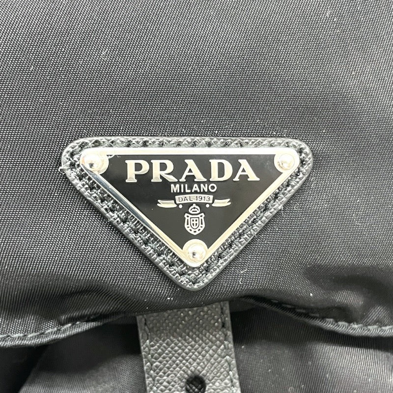 【PRADA】プラダ スモール バックパック 1BZ677 リュック・デイパック ナイロン レディース 巾着 ドローストリング ミニリュック 黒 ブラック サフィアーノ
